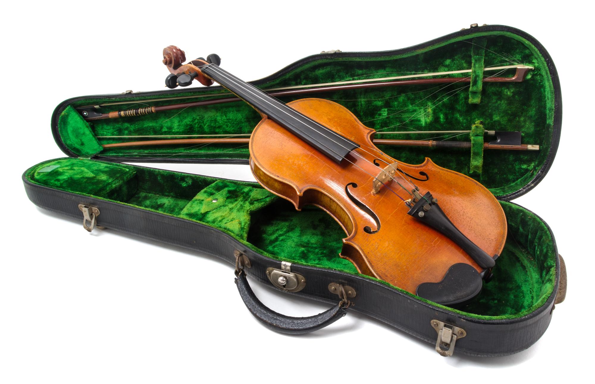 A Cased German Violin Length 23 3/4 inches.