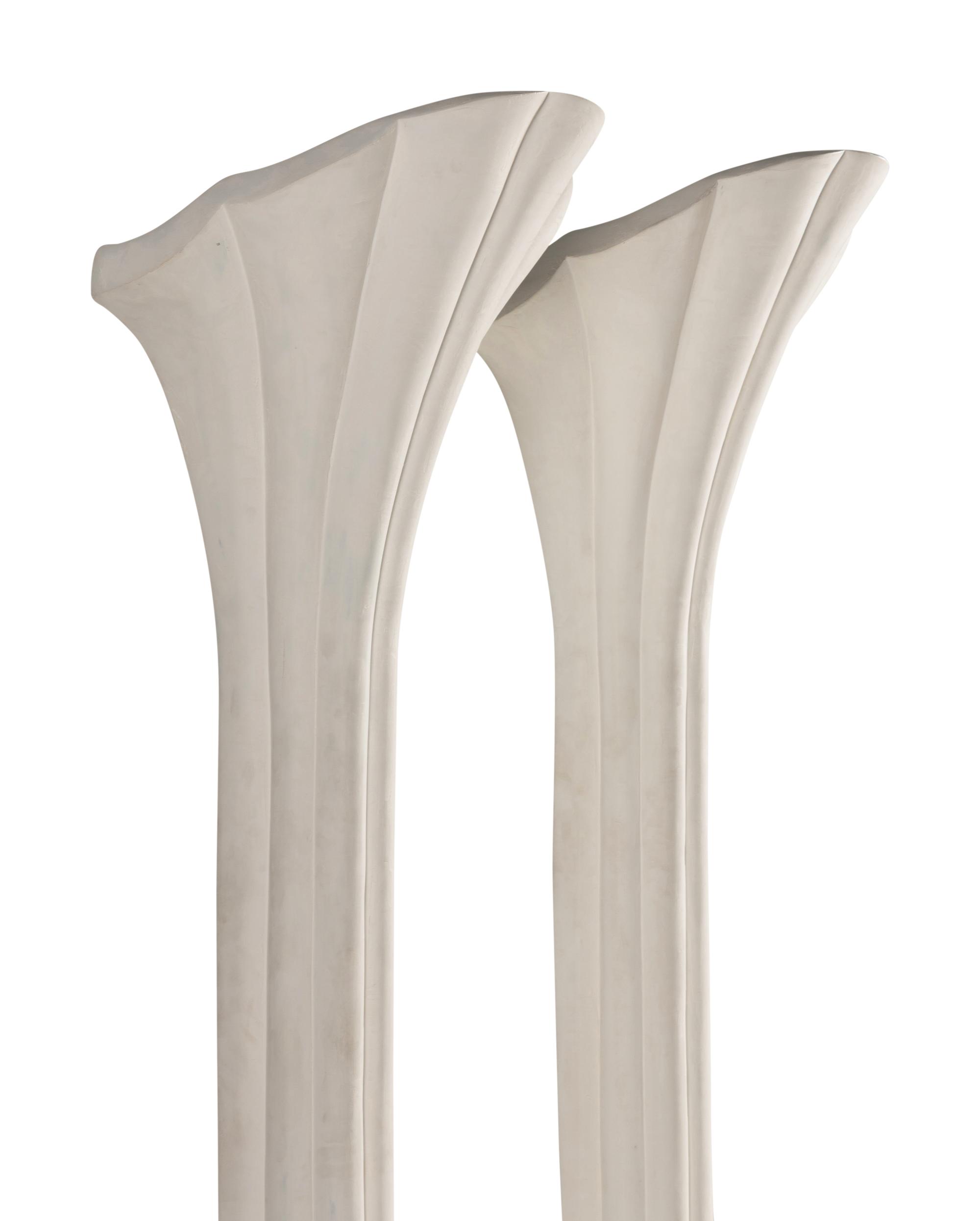 A Pair of Composition Torchères