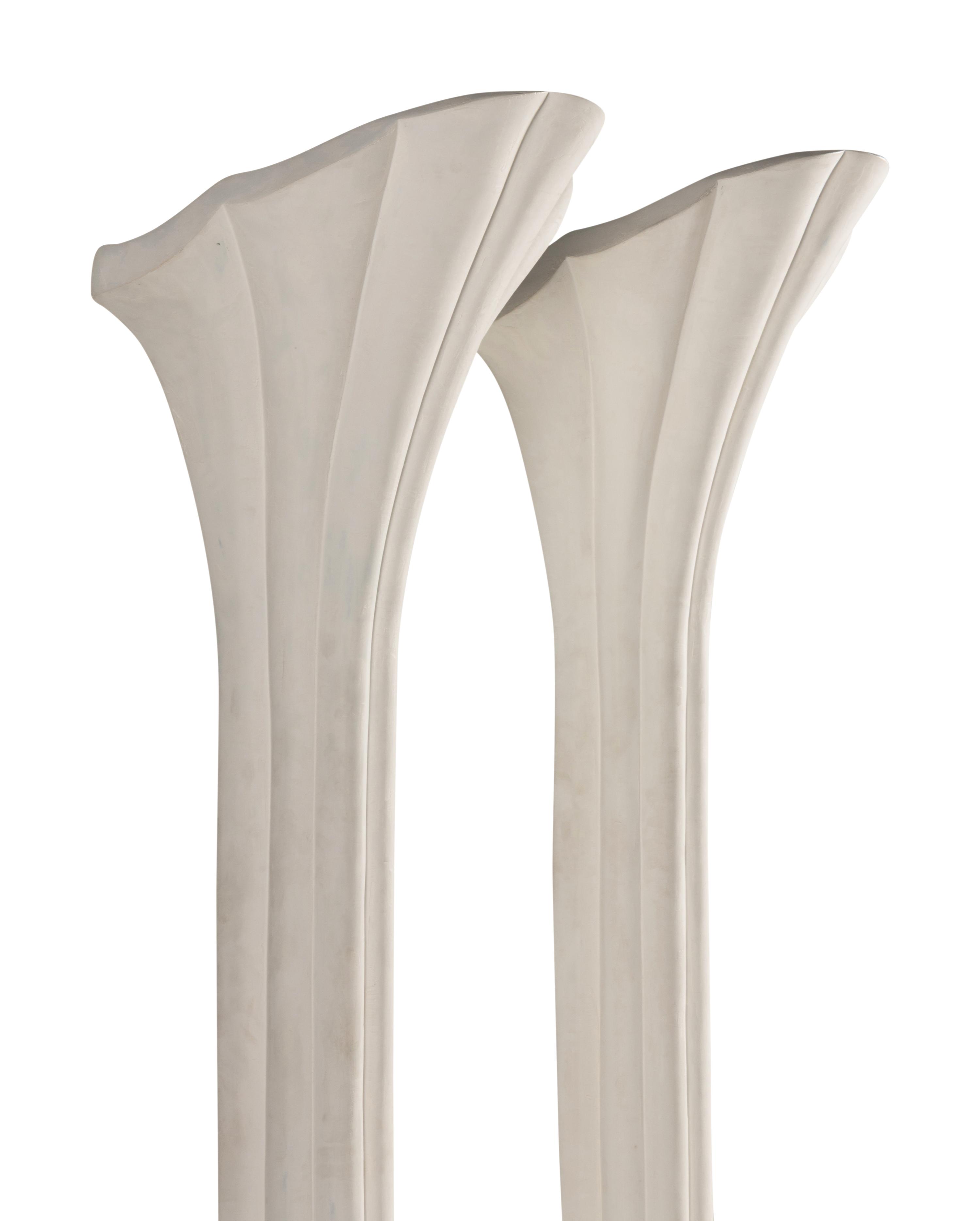 A Pair of Composition Torchères