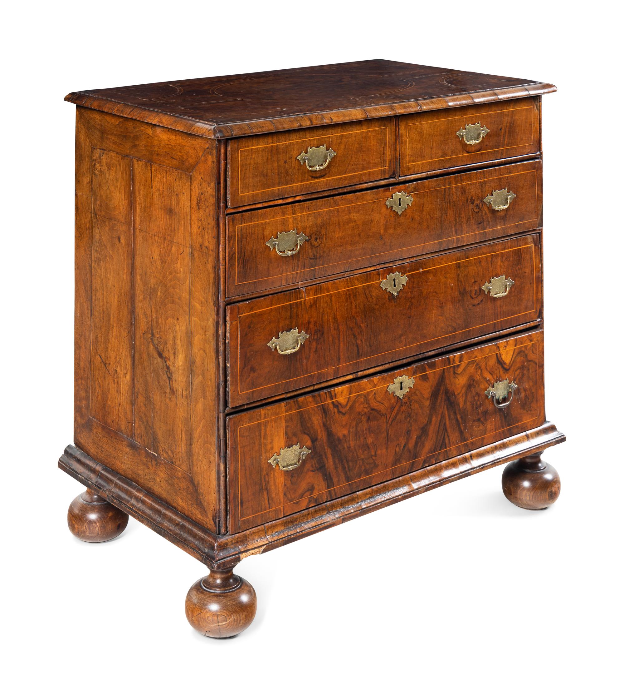 A George II Satinwood-Inlaid Walnut Chest of Drawers