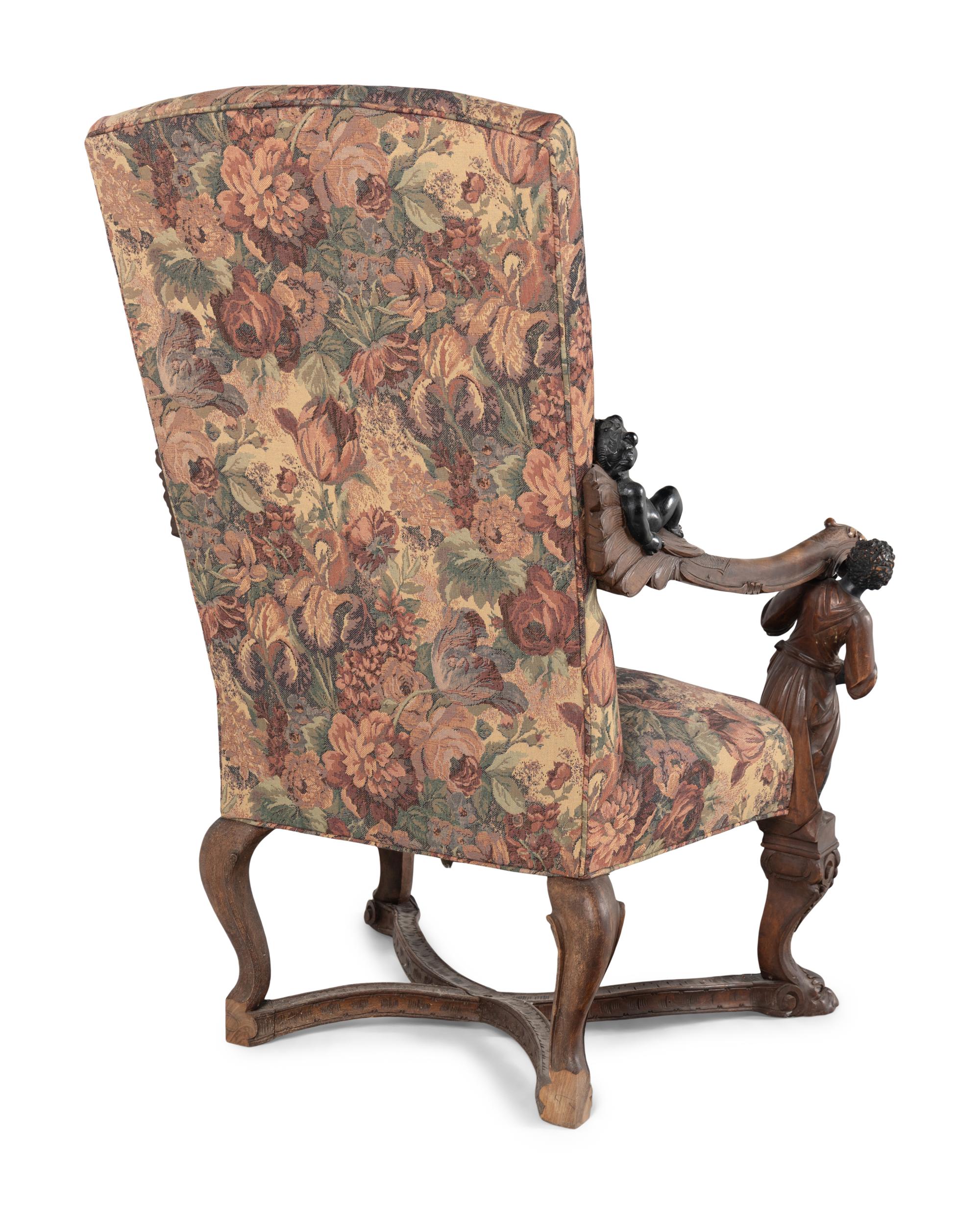 An Italian Baroque Style Carved Walnut Armchair