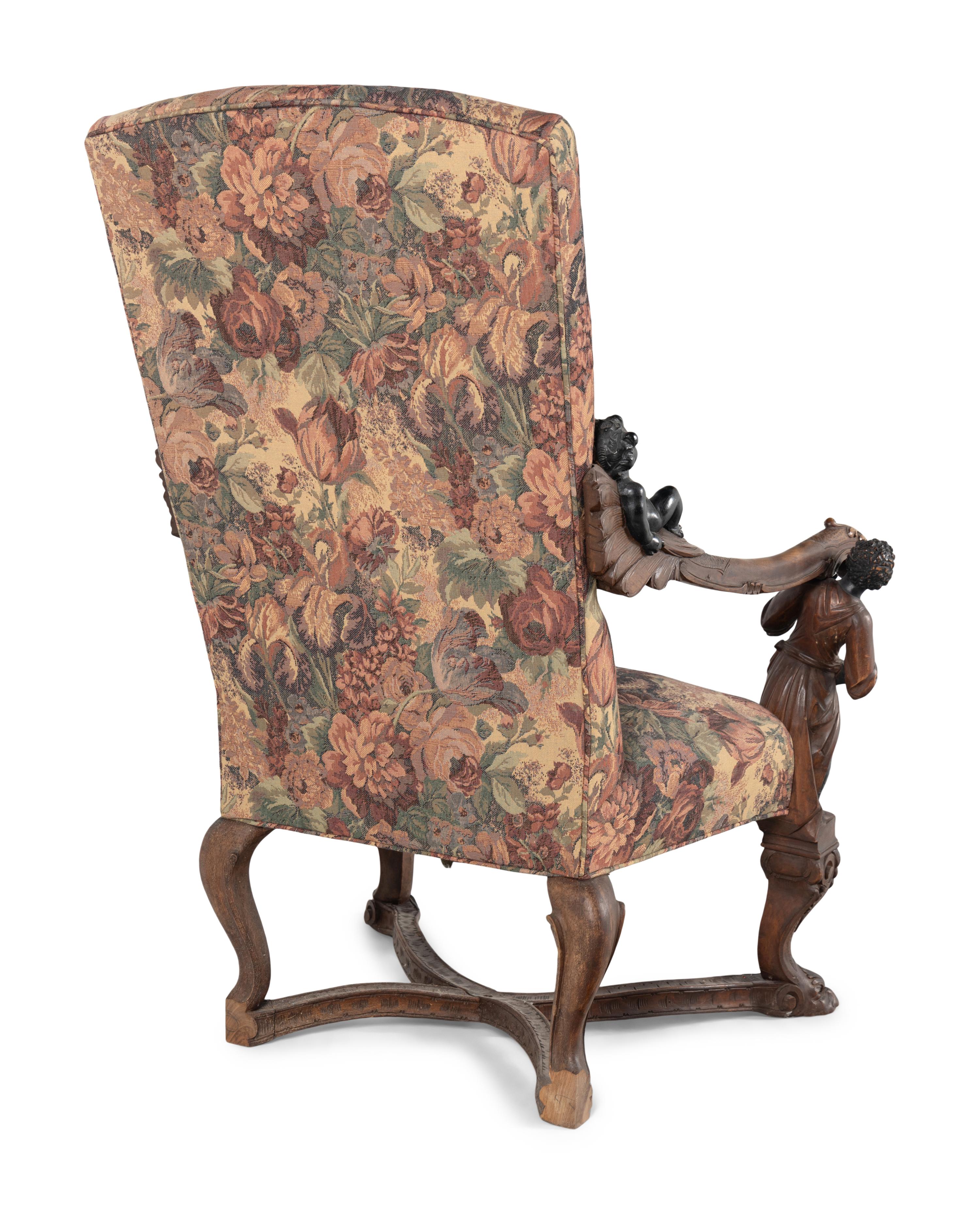 An Italian Baroque Style Carved Walnut Armchair
