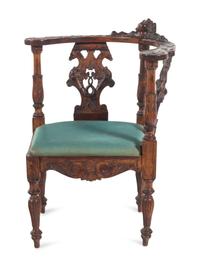 An English Carved Walnut Corner Chair