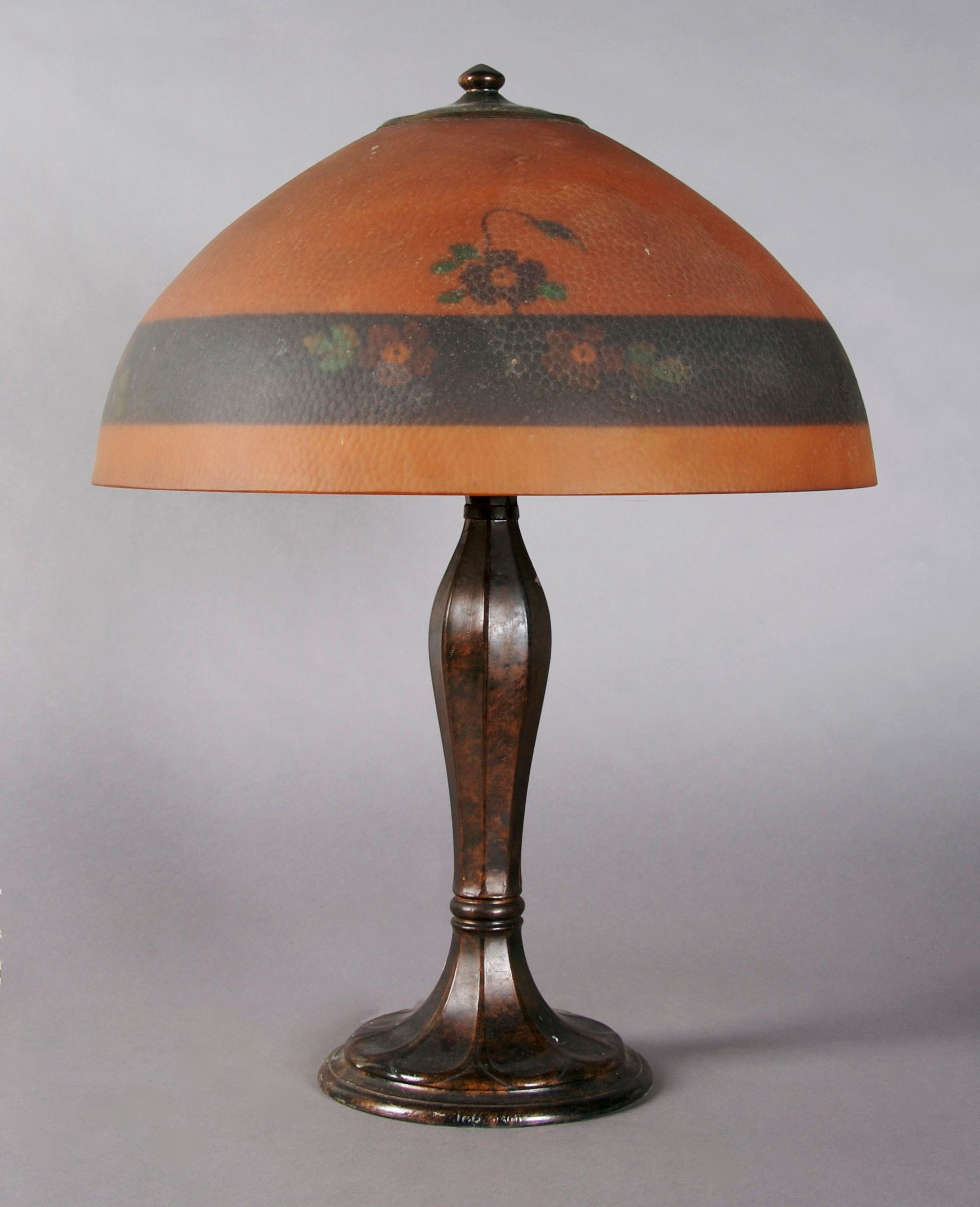 An American Reverse Painted Lamp, Jefferson, Diameter of shade 16 inches; height of lamp overall 21 1/2 inches.