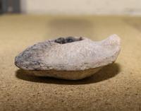 A Palestinian Pottery Oil Lamp Width 3 3/4 inches. — CIRCA 1ST CENTURY B.C.E.