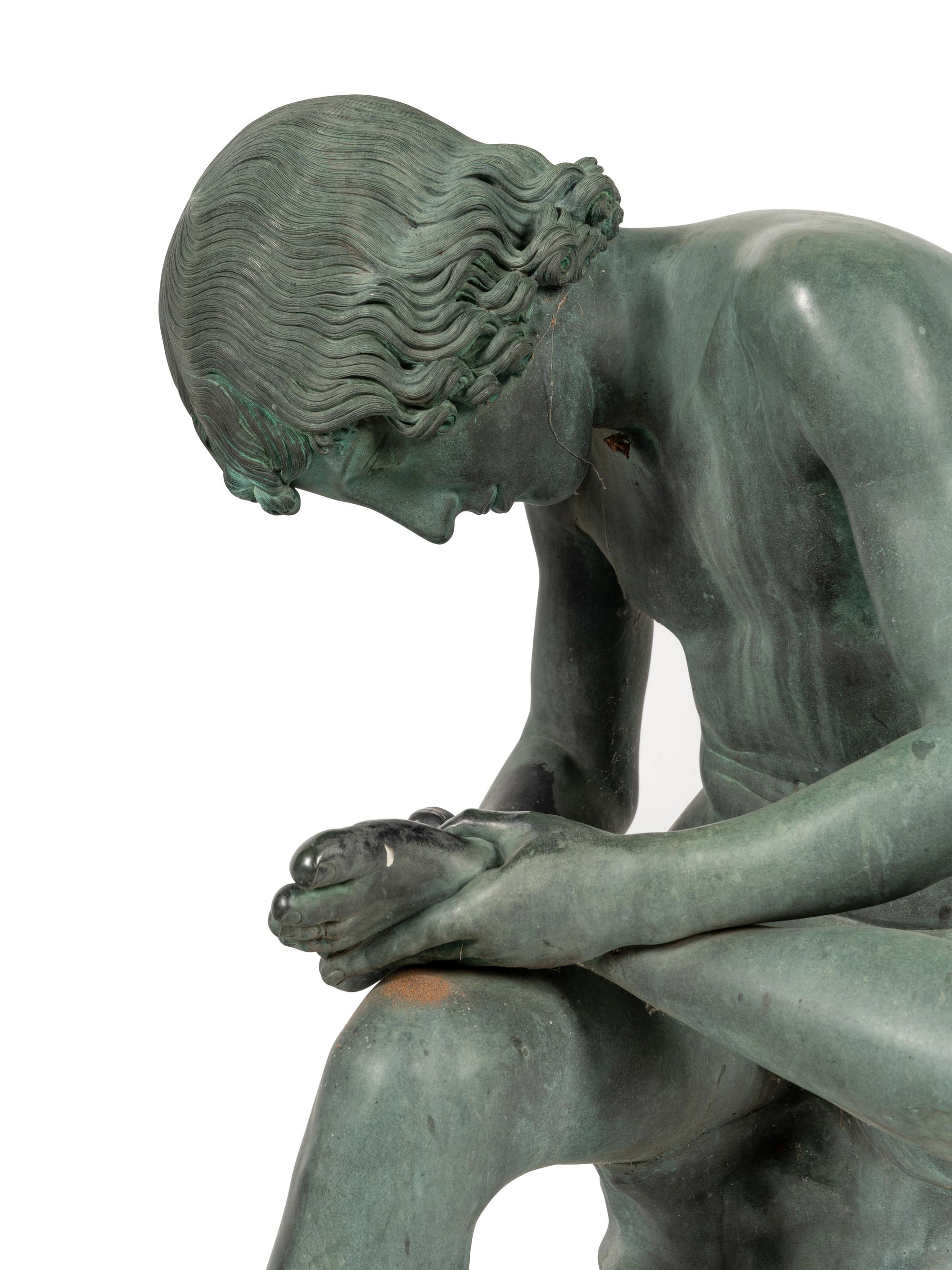 A Patinated Bronze Figure of the Spinario