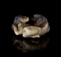A Small Black and Celadon Jade Figural Group of Two Horses