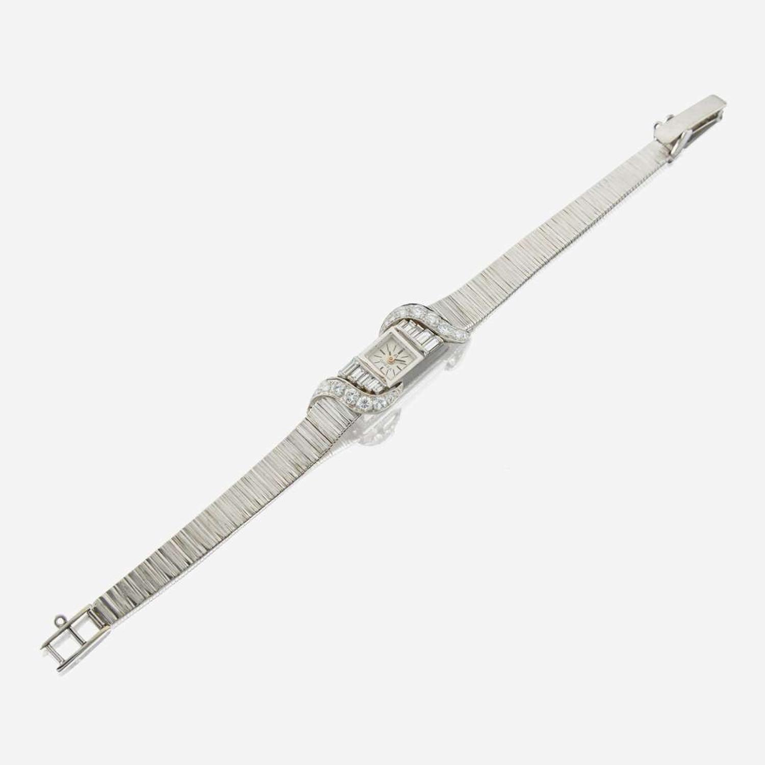 A white gold and diamond bracelet watch, Omega