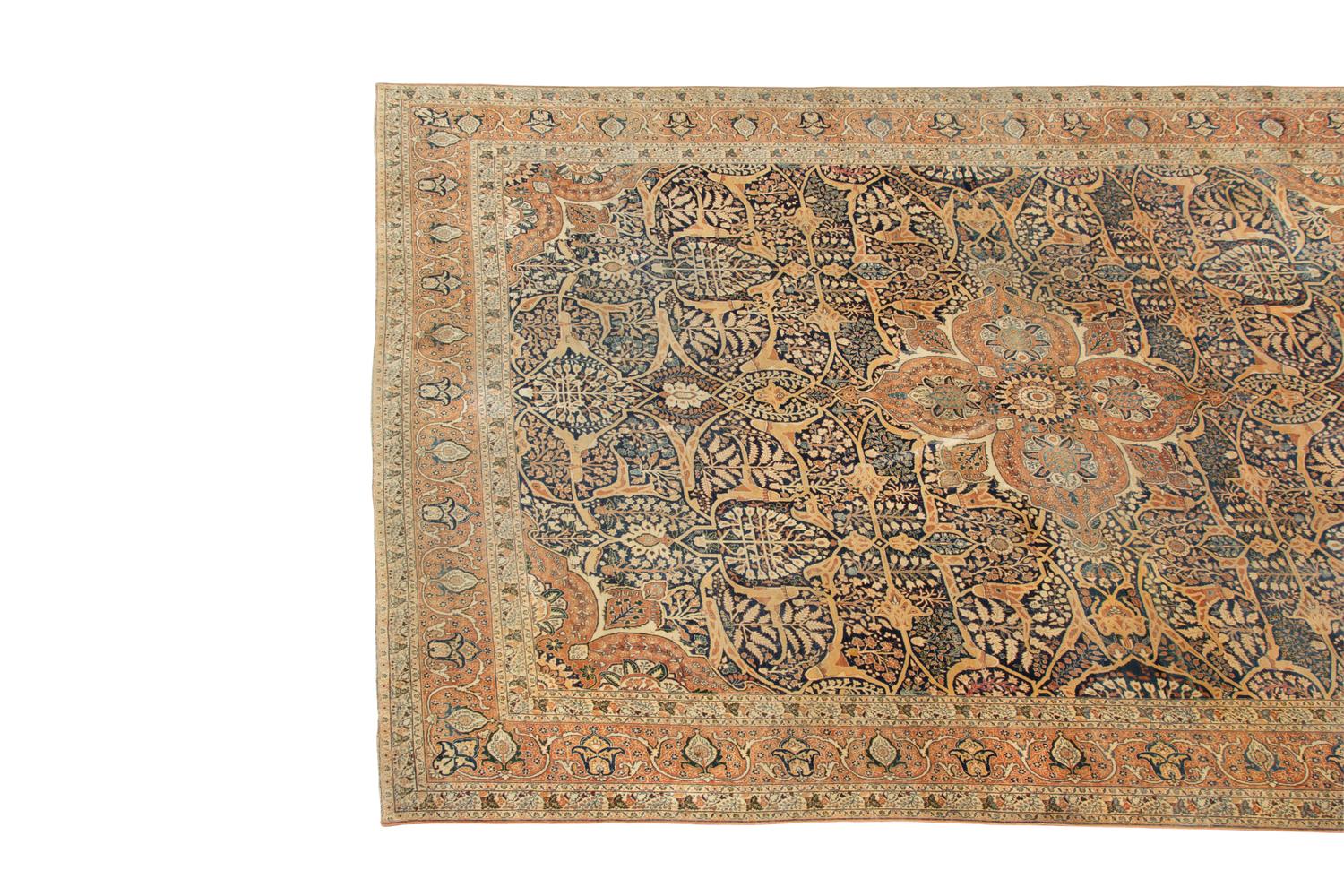 A Tabriz Carpet 13 feet 8 inches x 9 feet and 1 inch. — EARLY 20TH CENTURY