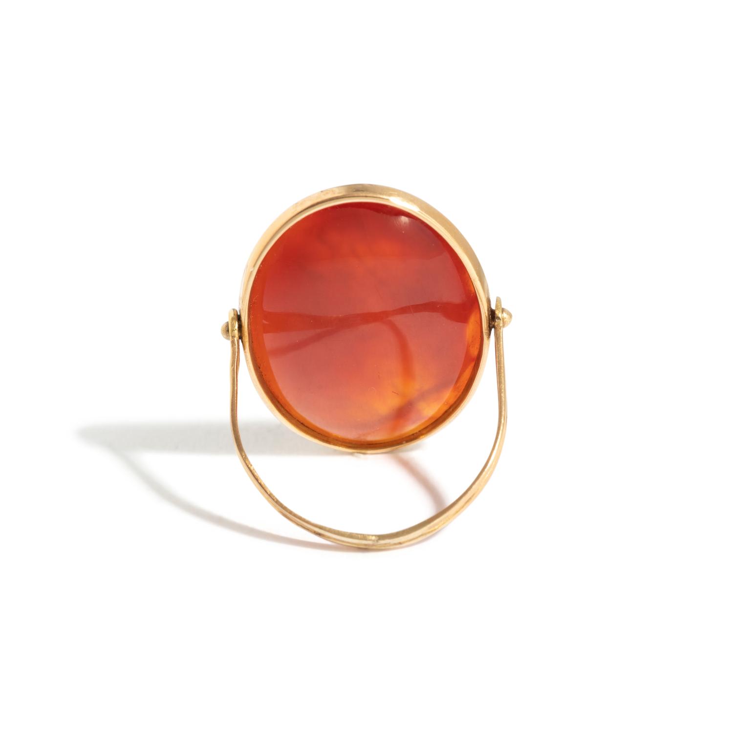 A Neoclassical Gold and Carnelian Swivel Ring with the Princess Leda