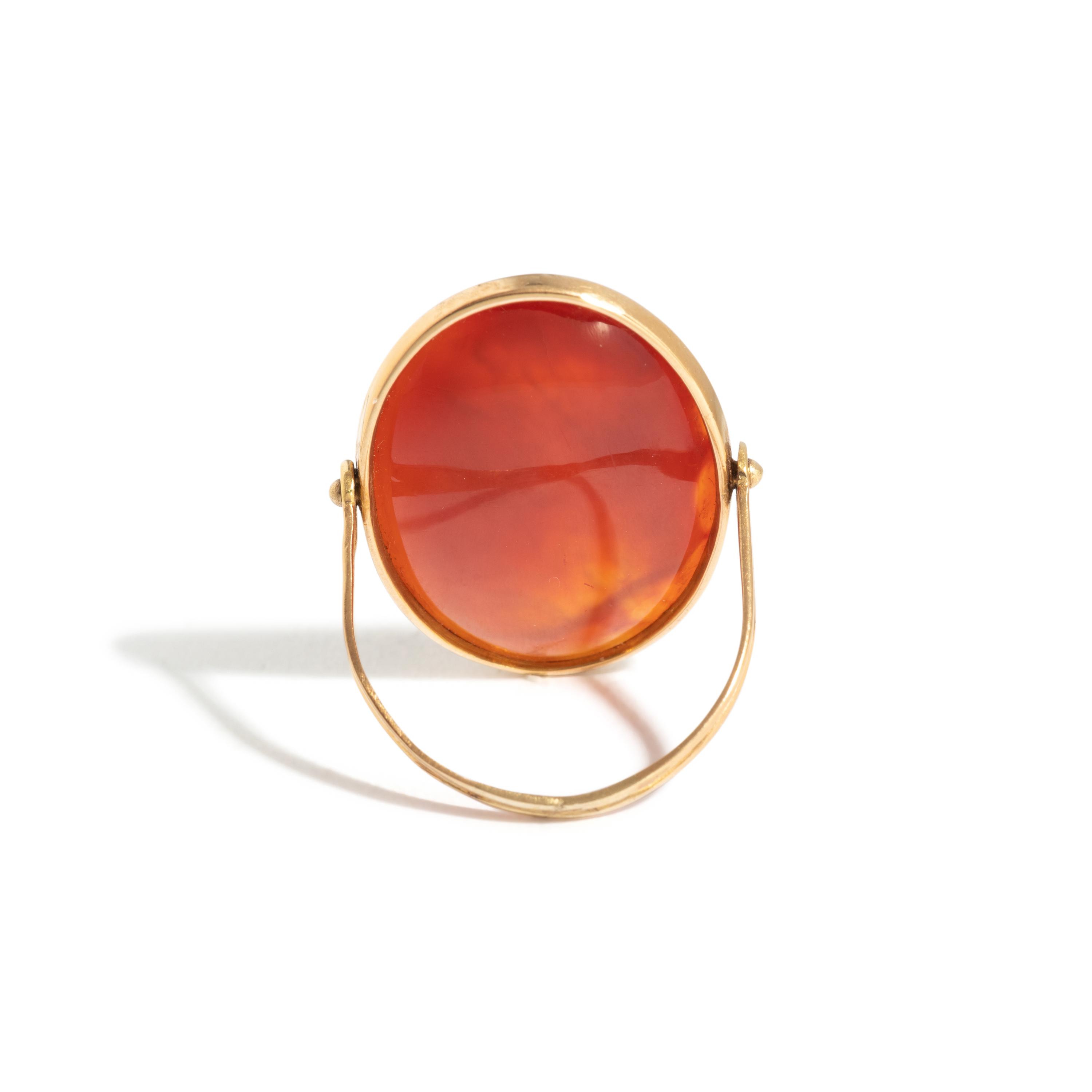 A Neoclassical Gold and Carnelian Swivel Ring with the Princess Leda