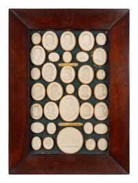 A Collection of Grand Tour Style Plaster Intaglios in Four Frames