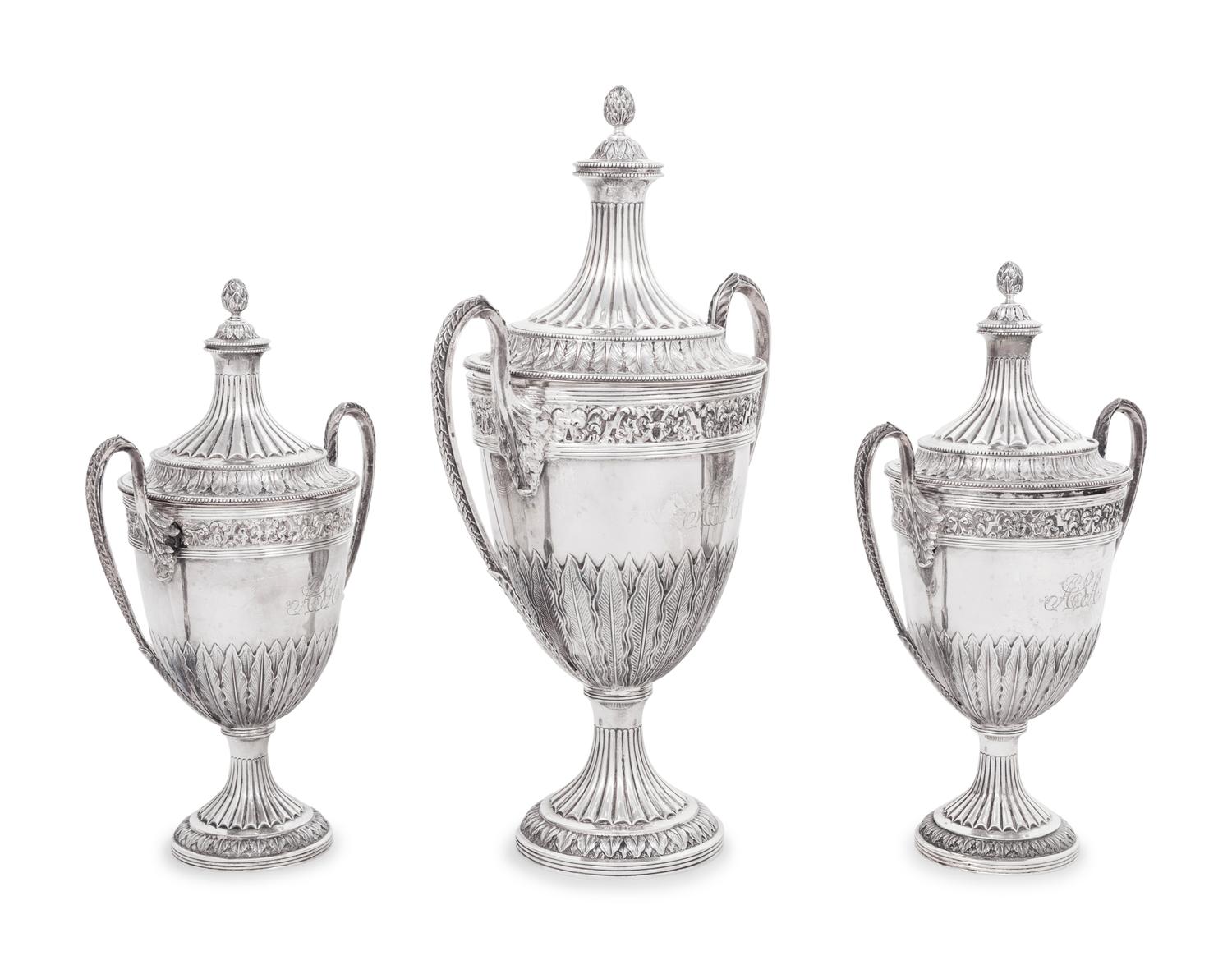 A Set of Three English Silver Covered Urns