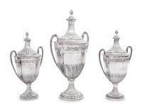 A Set of Three English Silver Covered Urns