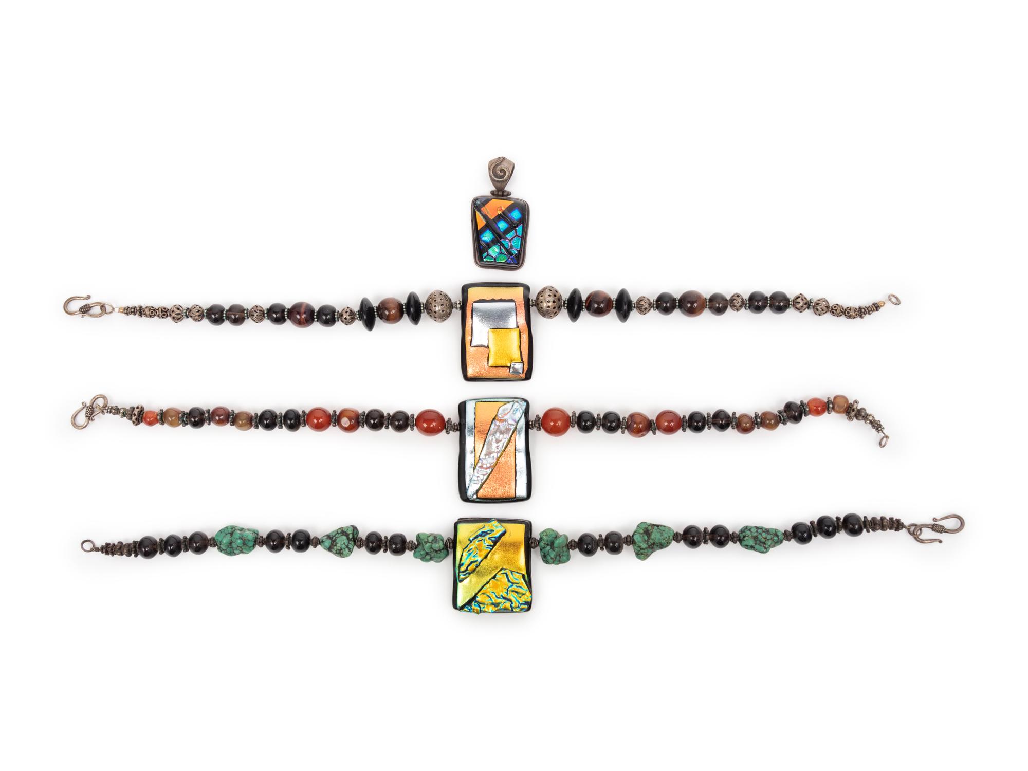 A Group of Thirteen Necklaces and Three Pendants