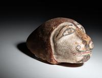 An Egyptian Polychrome Wood Head of a Lion