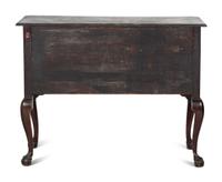 An Oversized Queen Anne Stained Shell-Carved Cherrywood Faux-Marble Top Dressing Table