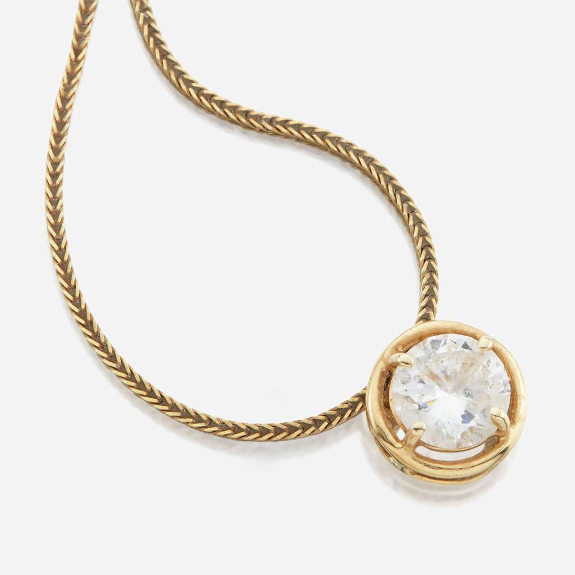 A collection of four gold necklaces
