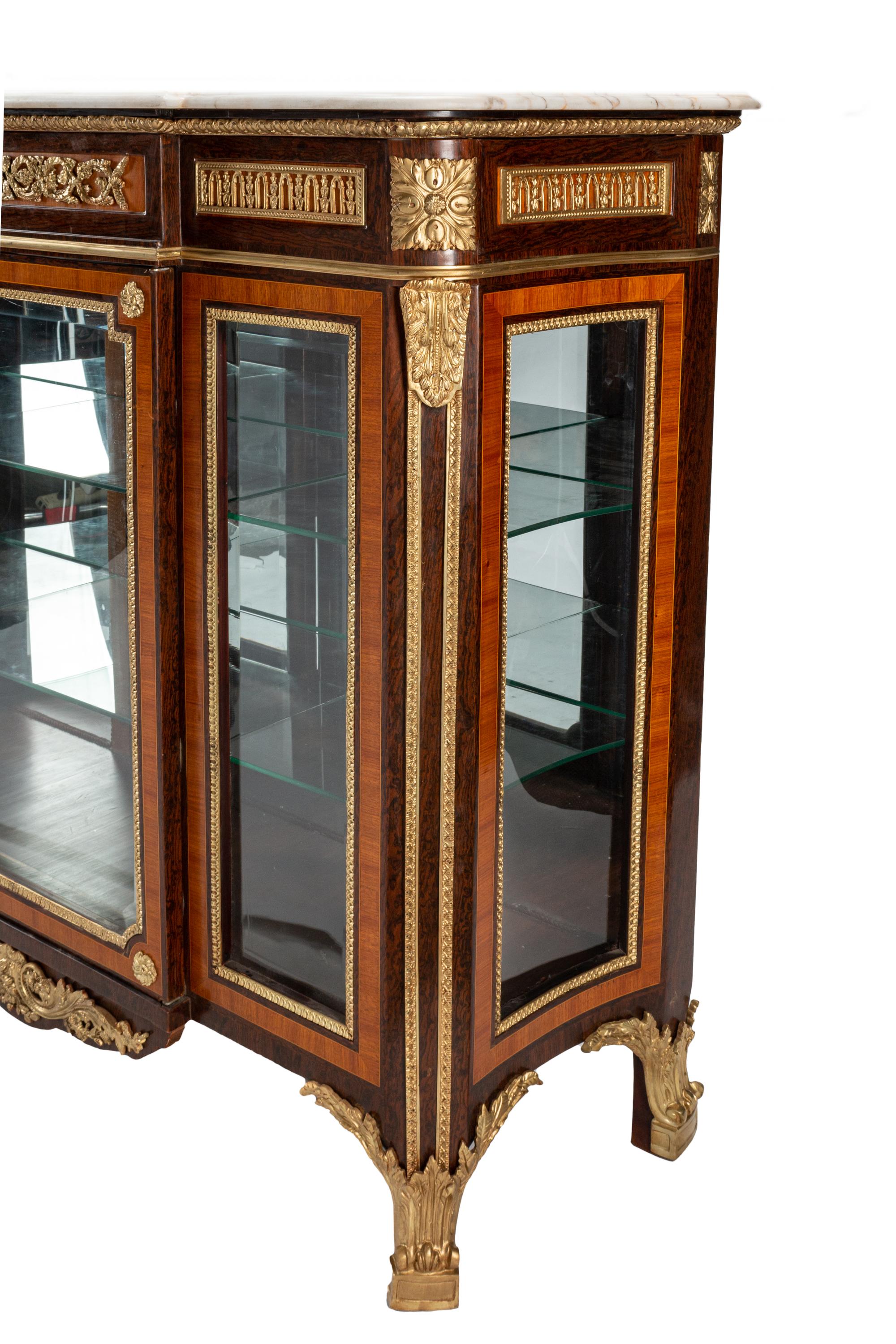 A Louis XV Style Gilt Bronze Mounted Mahogany Vitrine Cabinet