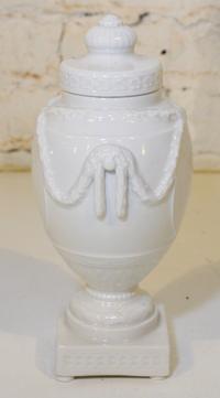 A KPM Blanc de Chine Urn. Height 9 inches.