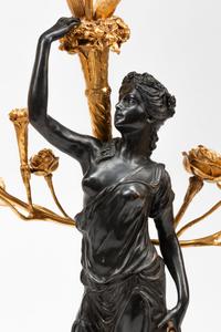 A Pair of French Gilt and Patinated Bronze and Marble Figural Three-Light Candelabra