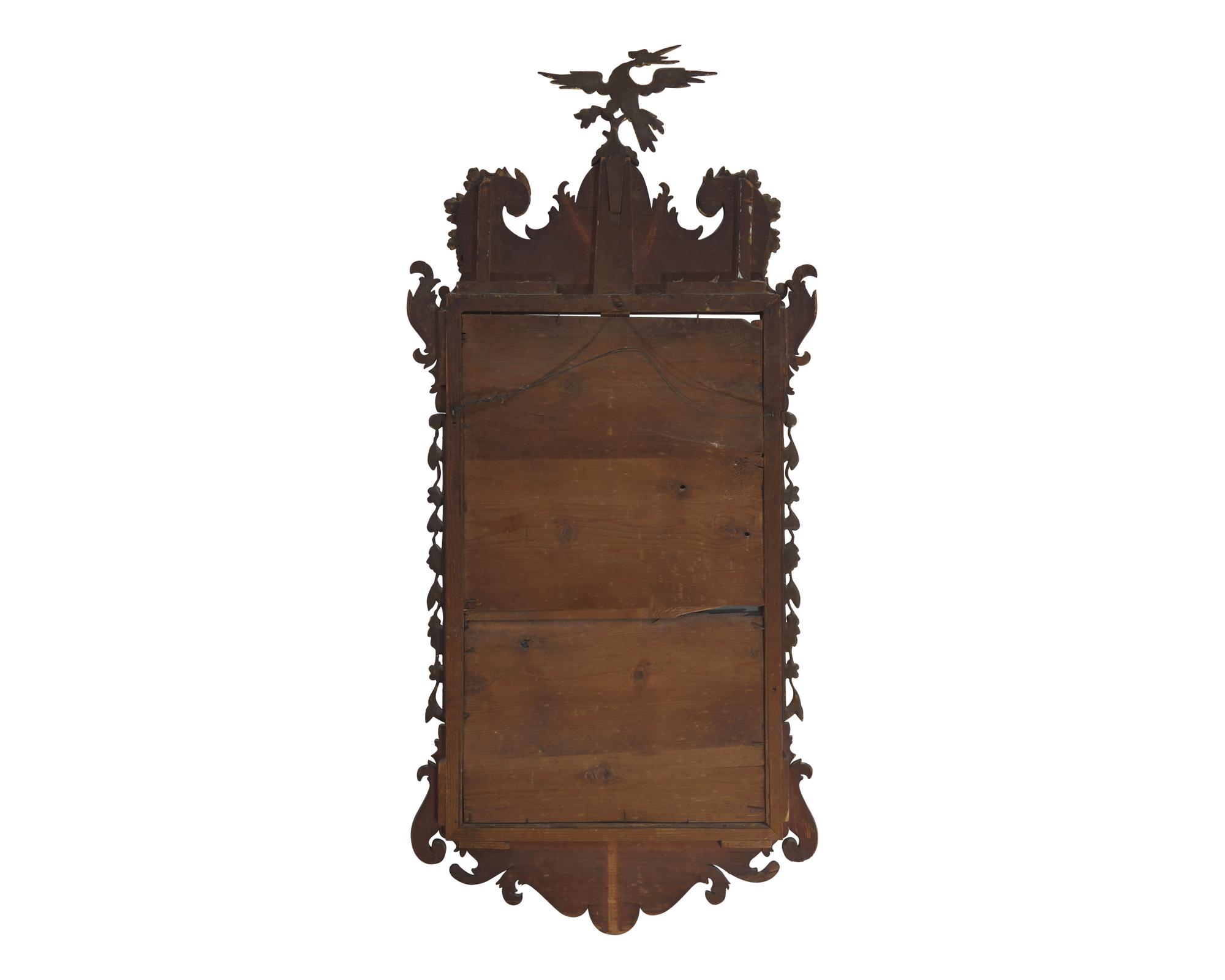 A Chippendale Mahogany and Parcel-Gilt Looking Glass, Circa 1770