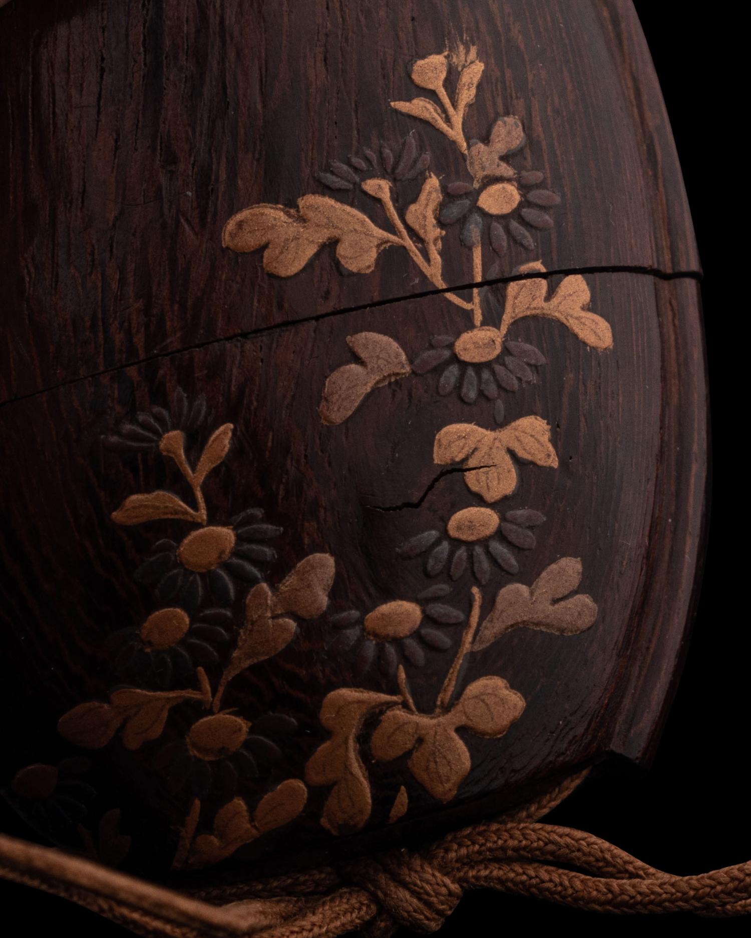 A Japanese Gold and Brown Lacquered Wood Two-Case Inro