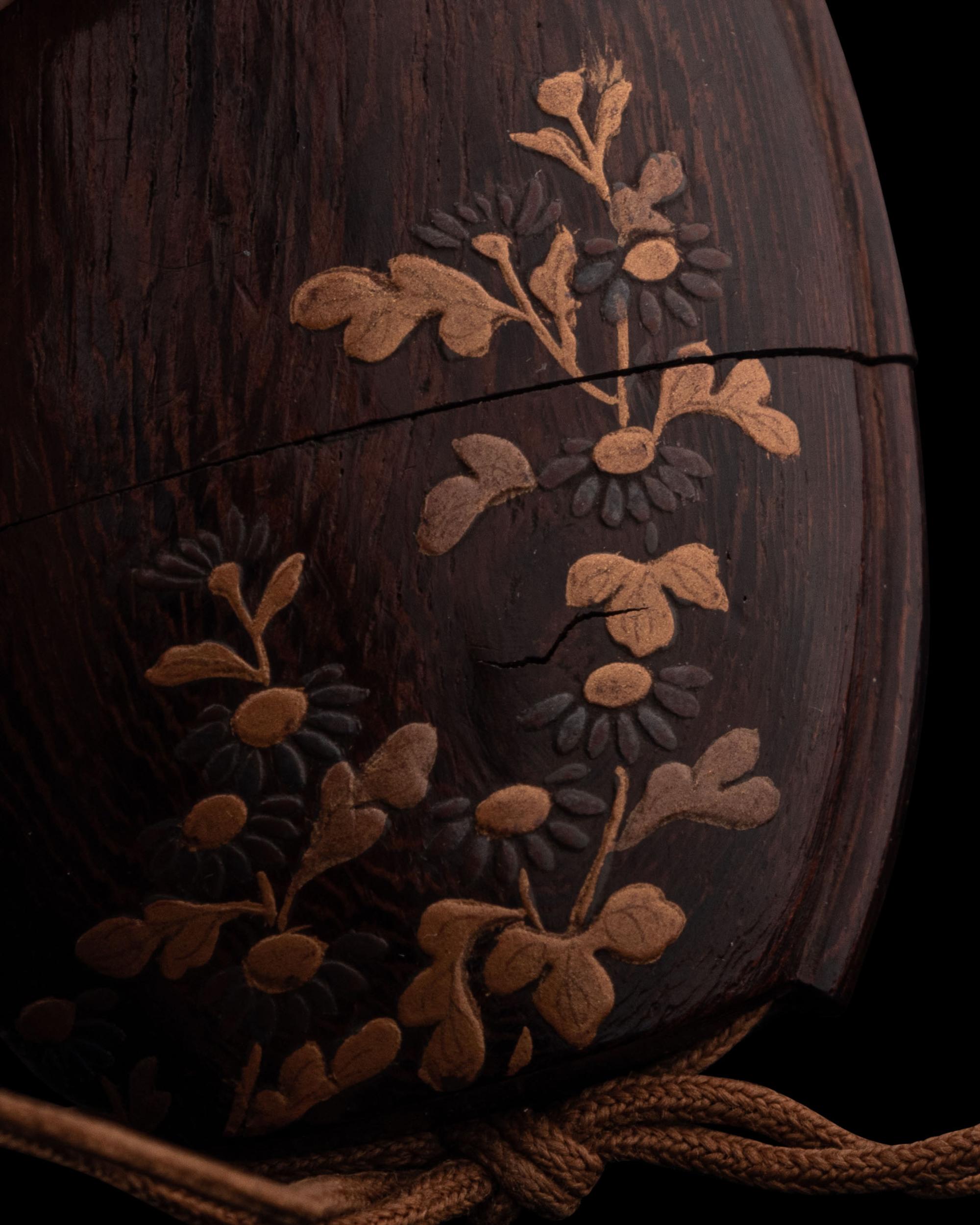 A Japanese Gold and Brown Lacquered Wood Two-Case Inro