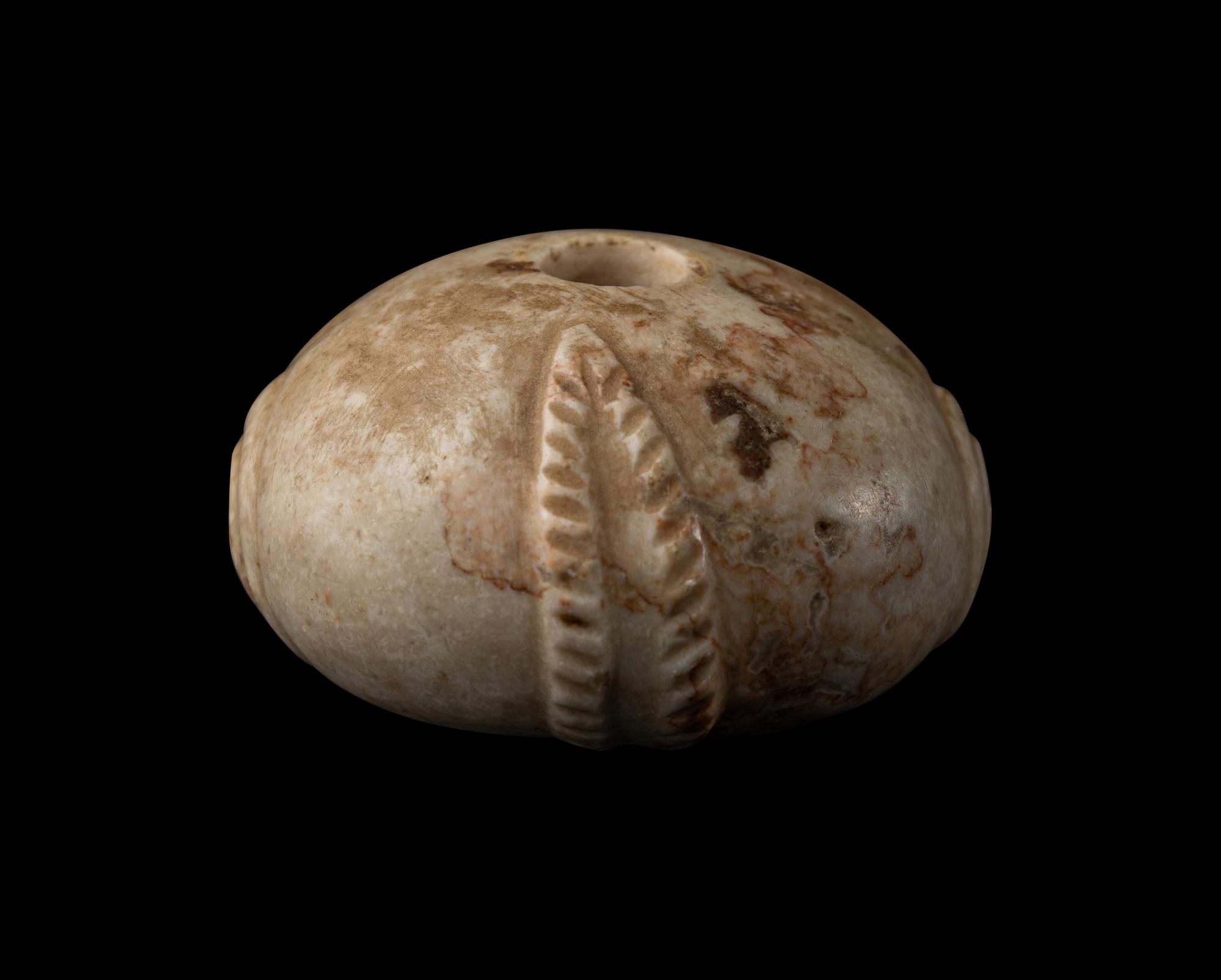 A Near Eastern Marble Mace Head