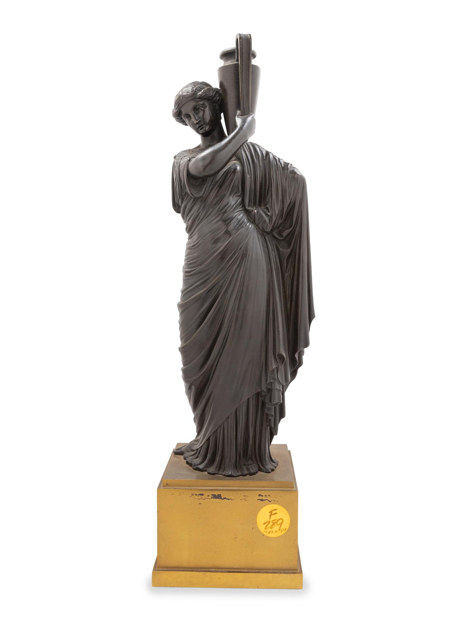 A Continental Bronze Figure of a Classical Maiden with an Ewer