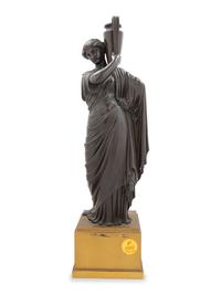 A Continental Bronze Figure of a Classical Maiden with an Ewer