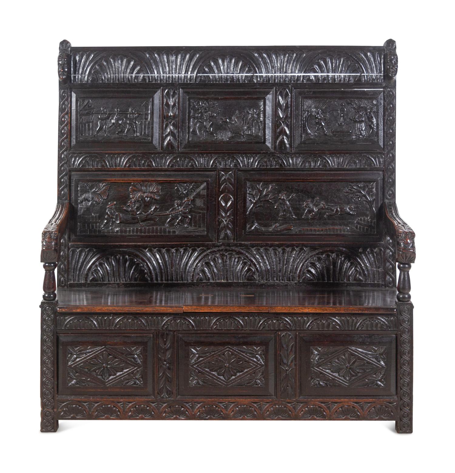 A William and Mary Style Carved Oak Settle