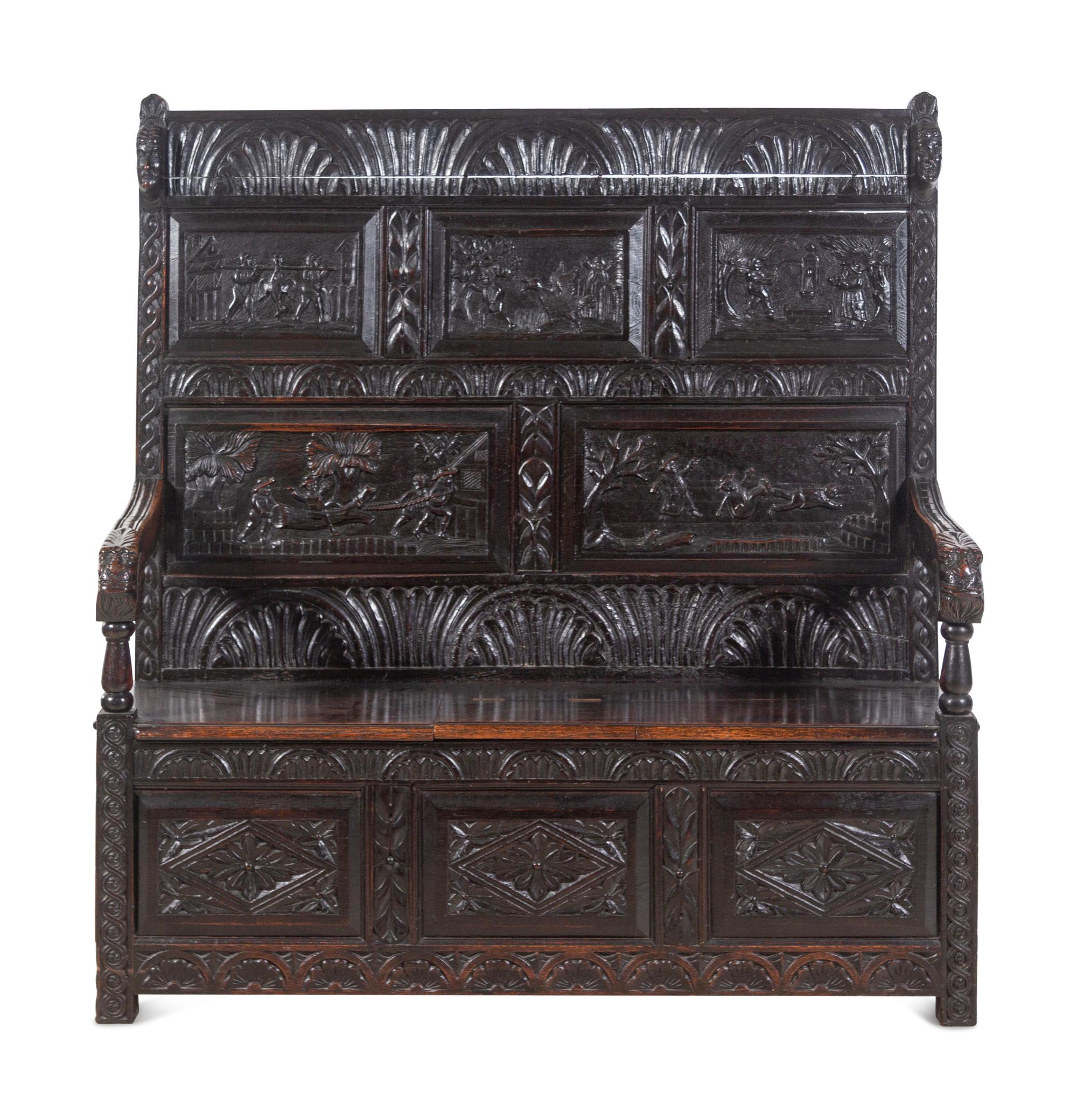 A William and Mary Style Carved Oak Settle