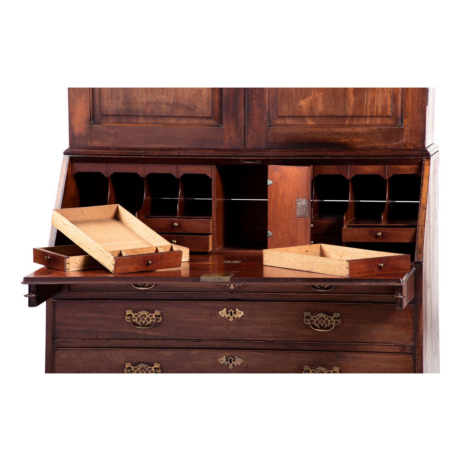 A George III Carved and Paneled Mahogany Secretary Bookcase