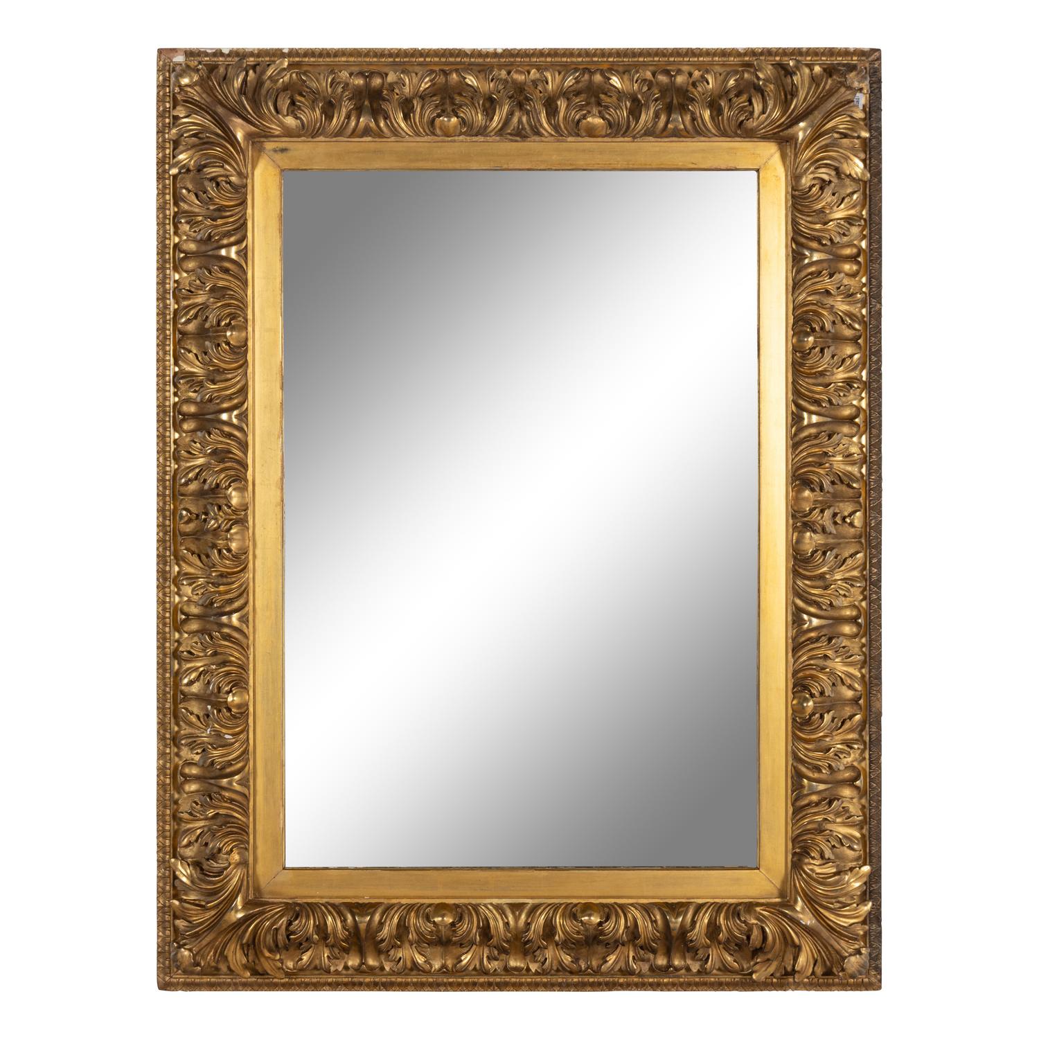 A Continental Baroque Style Carved Giltwood Mirror