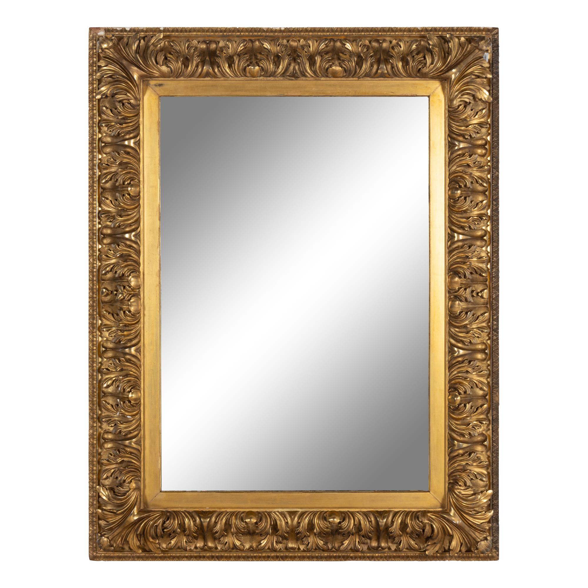 A Continental Baroque Style Carved Giltwood Mirror