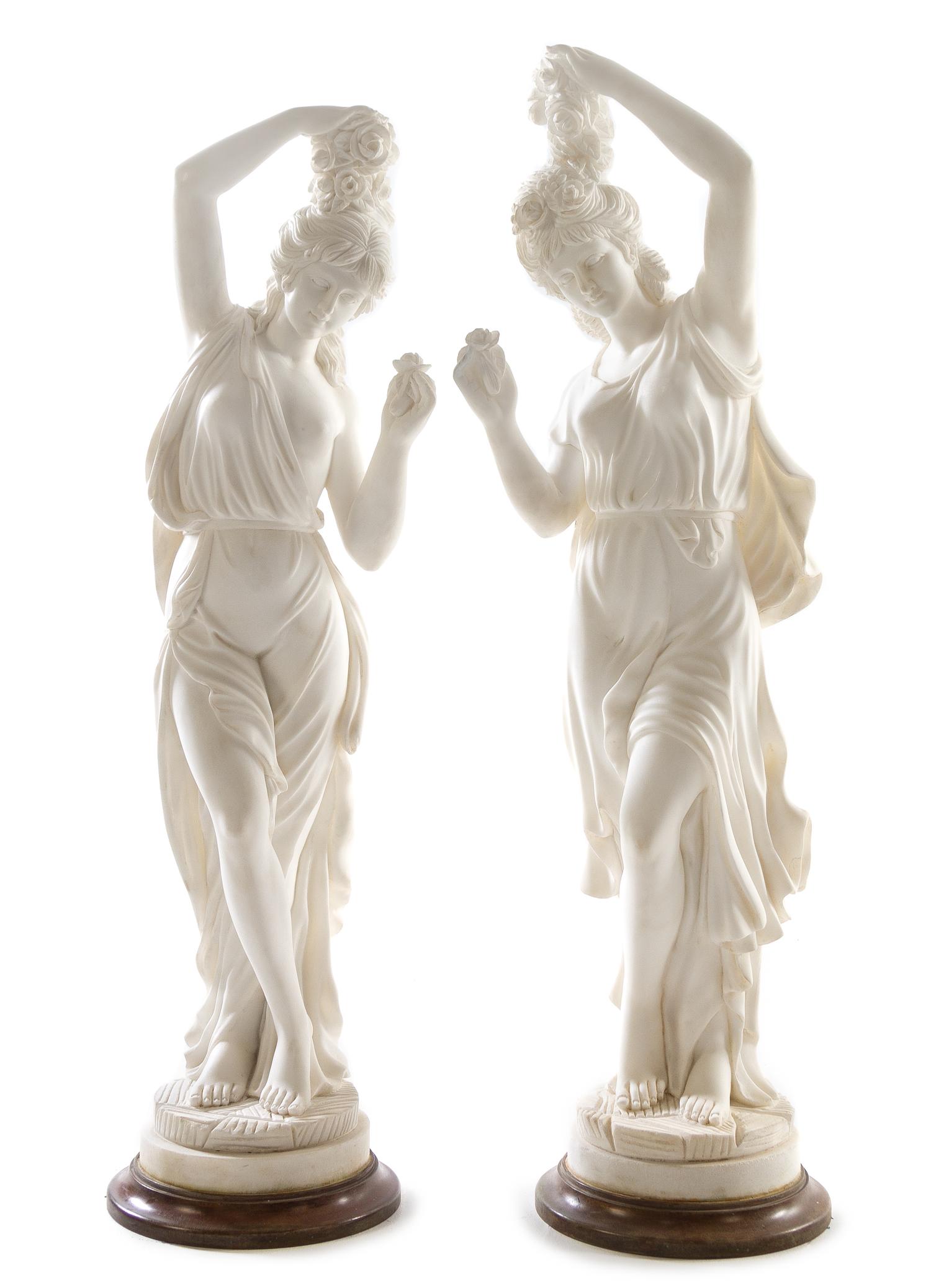 A Pair of Italian Marble Figures Height of tallest 42 1/4 inches. — 20TH CENTURY
