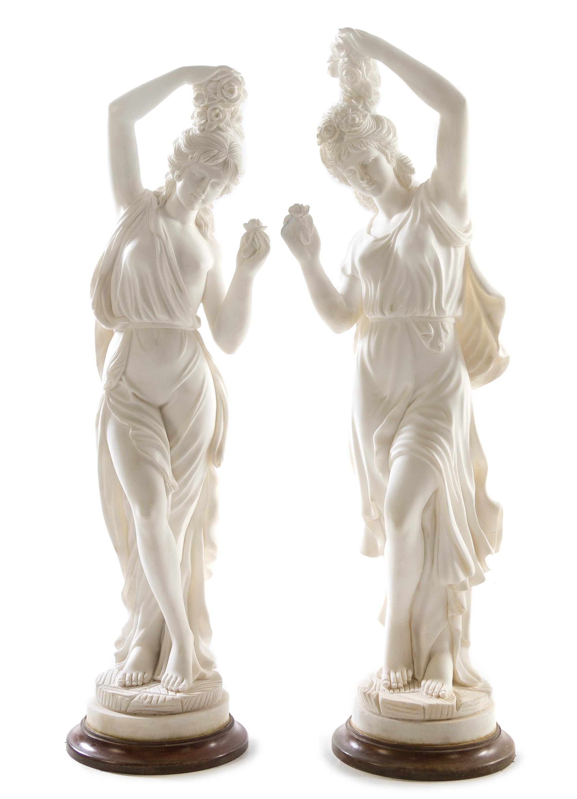 A Pair of Italian Marble Figures Height of tallest 42 1/4 inches. — 20TH CENTURY