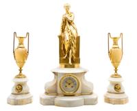 A French Gilt Bronze Mounted Onyx Clock Garniture Height of clock 25 inches.