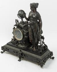 A Continental Cast Metal Mantel Clock Height 19 inches. — 19TH CENTURY