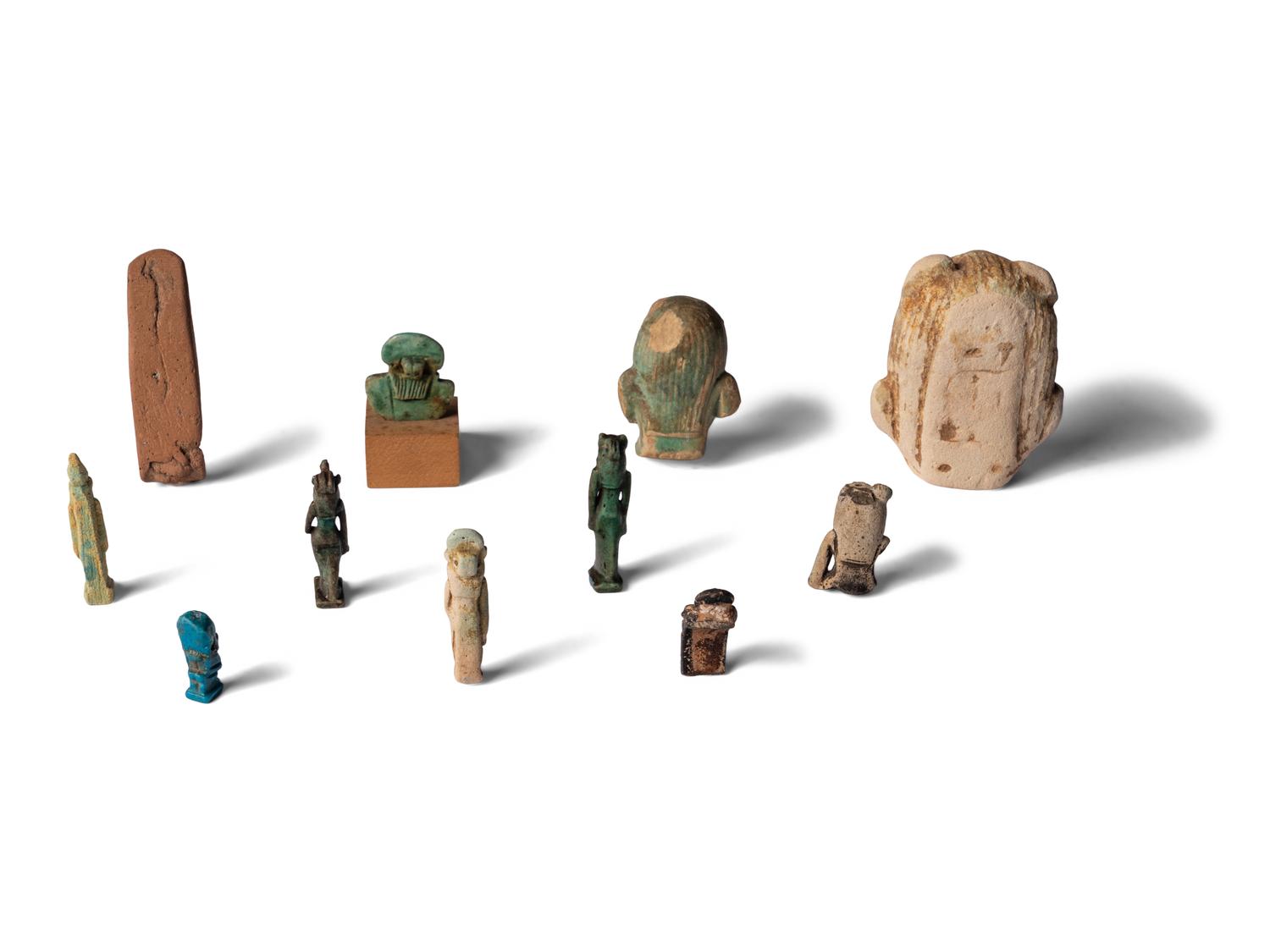Eleven Egyptian Faience and Terracotta Sekhmet Amulets and Figures