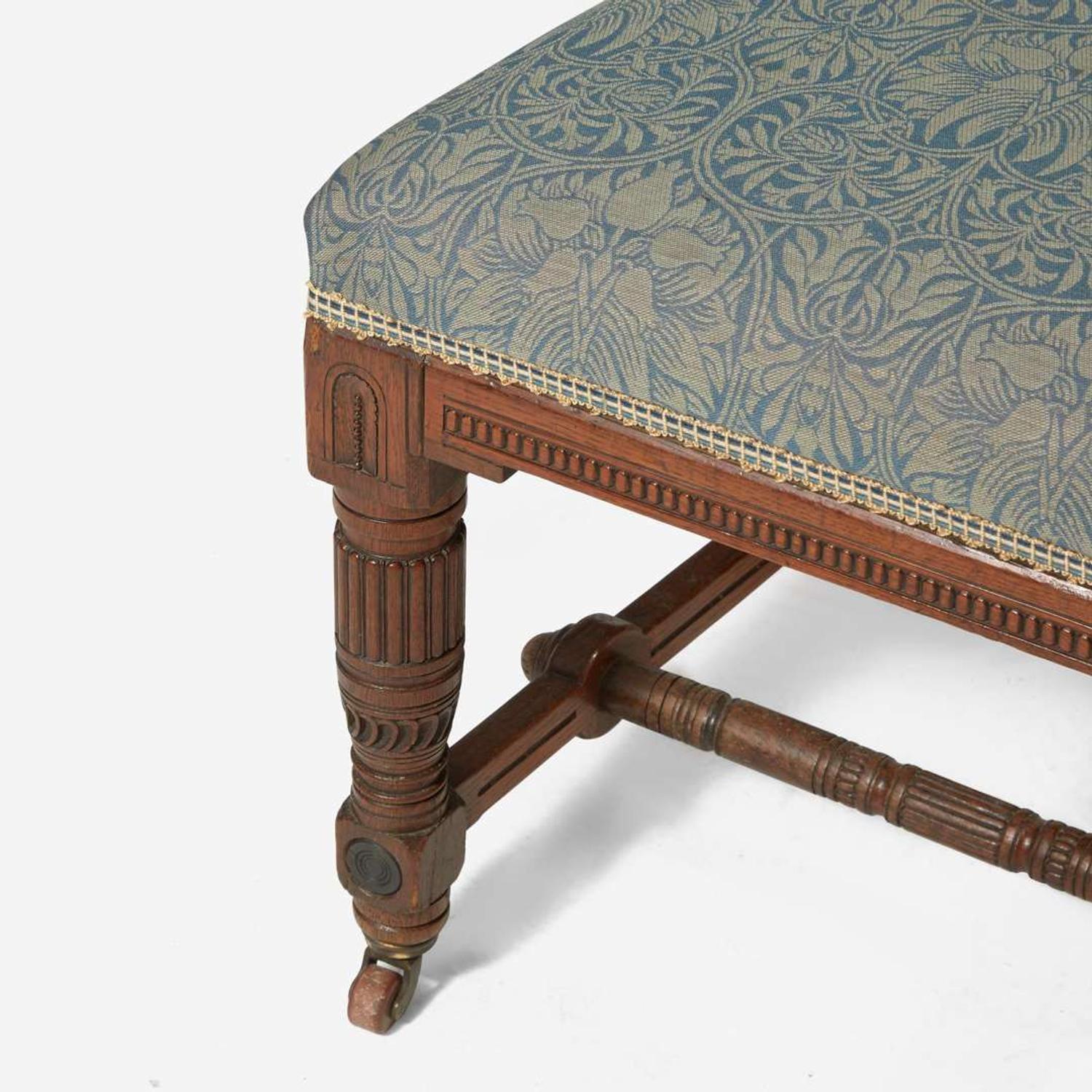 An English Aesthetic Movement carved oak dining table and set of twelve dining chairs Lamb of Manchester, Manchester, England, circa 1875