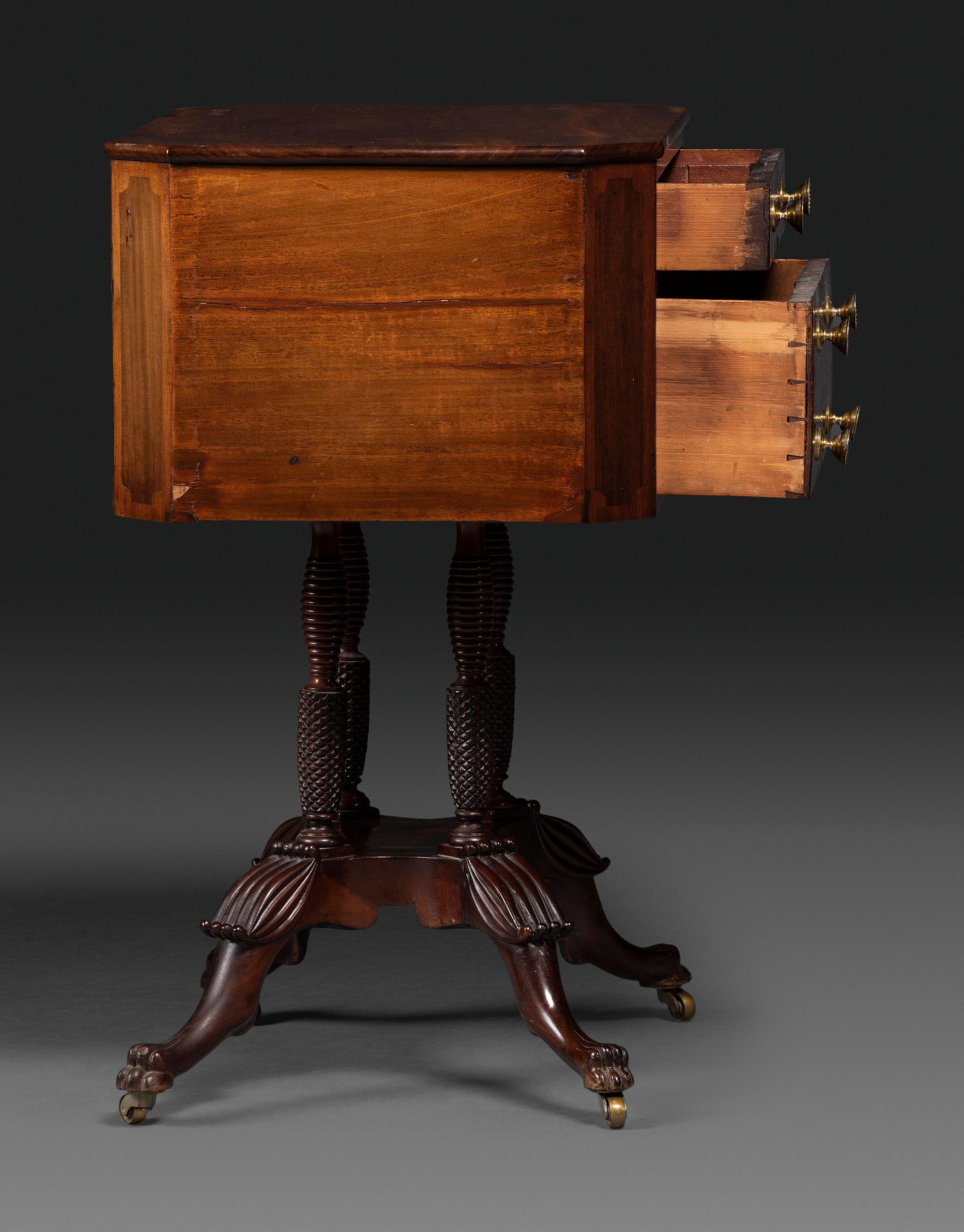 A Classical Figured Mahogany Two Drawer Claw-Foot Work Table