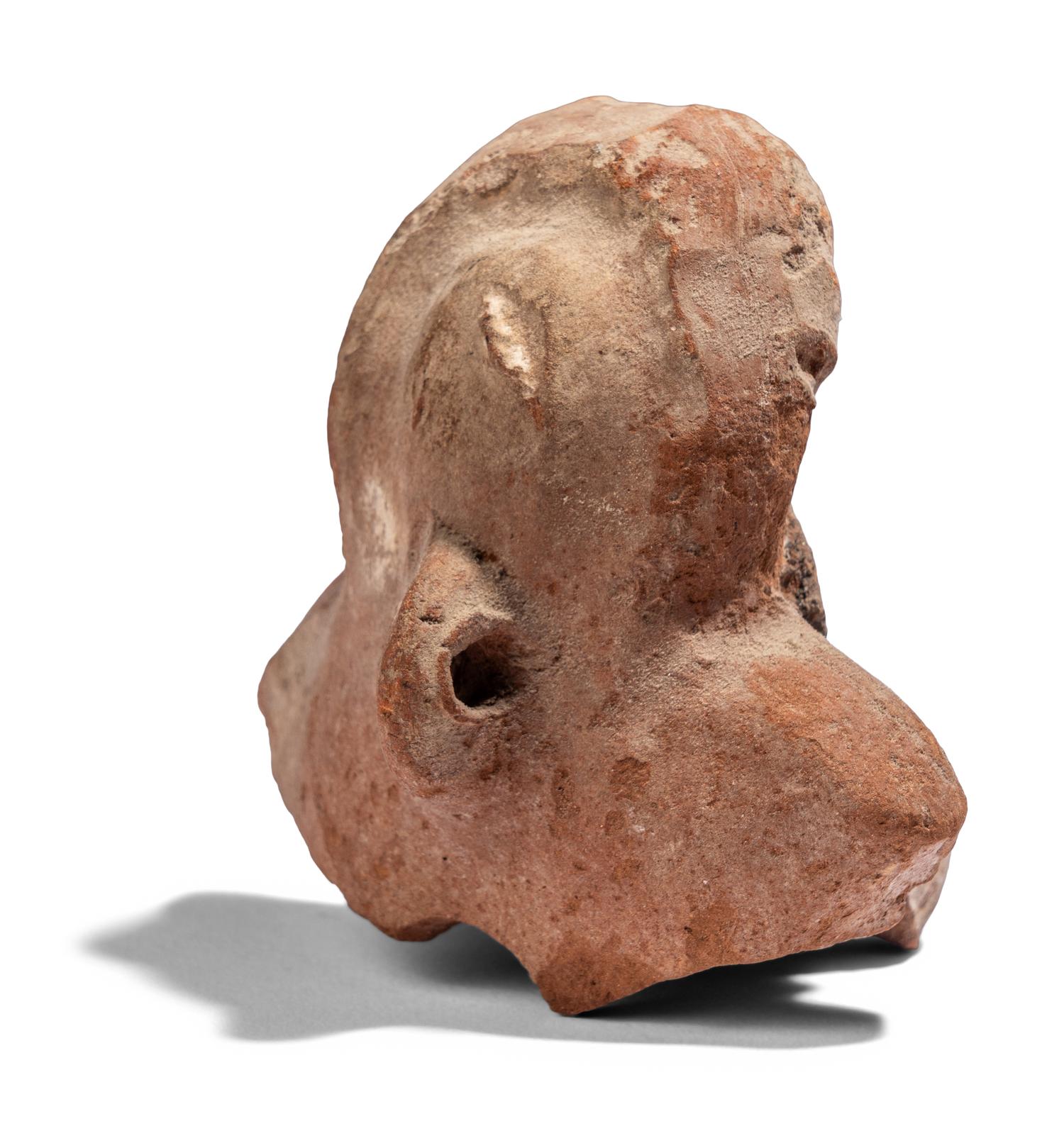 An Egyptian Terracotta Bust of Baubo