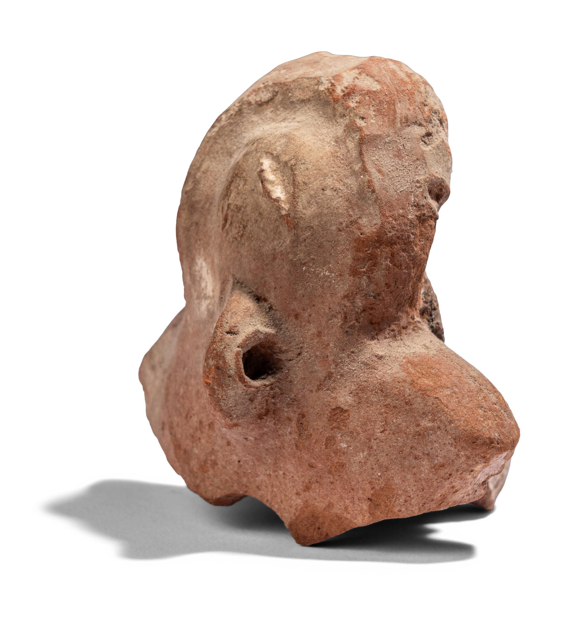 An Egyptian Terracotta Bust of Baubo