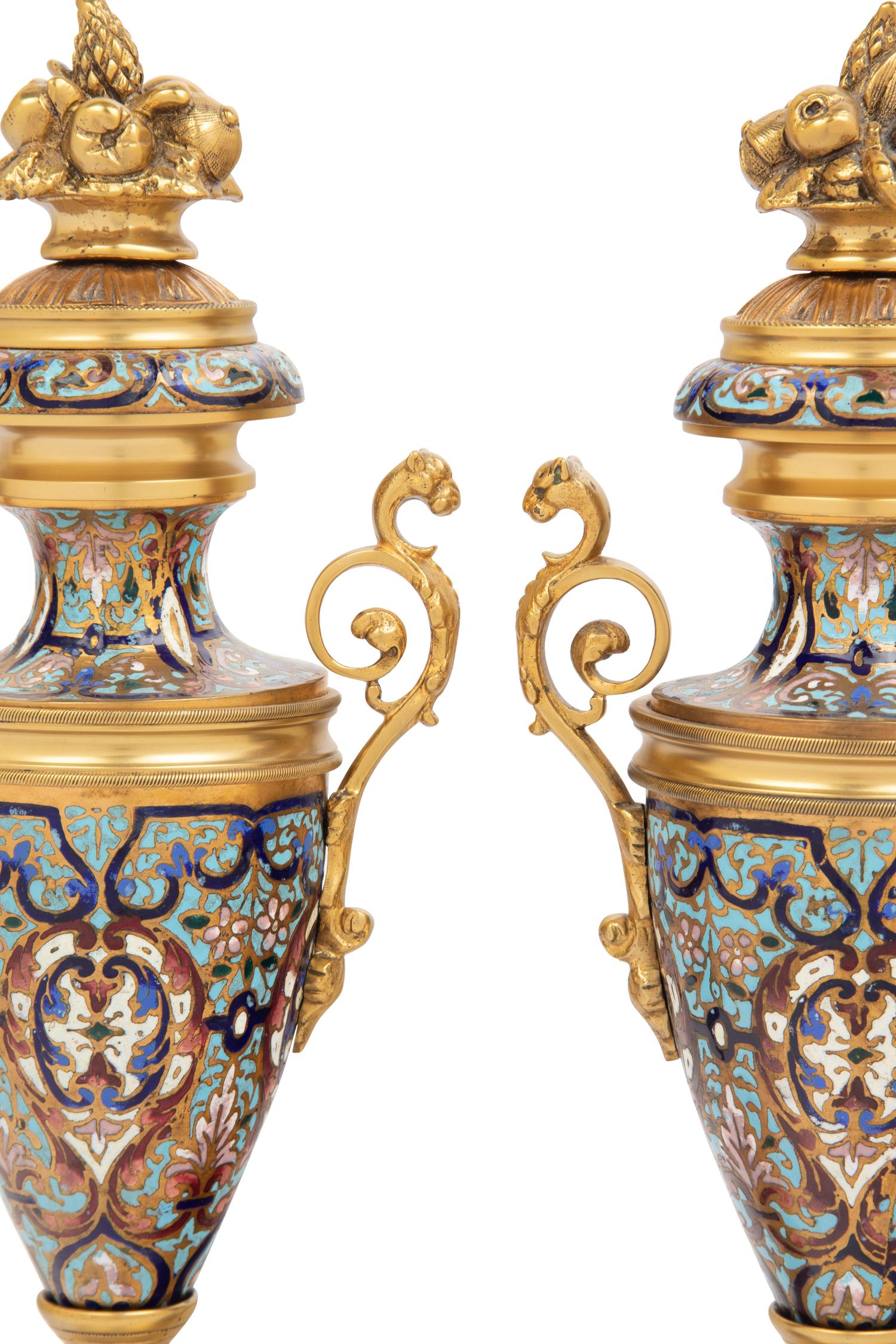A Pair of French Gilt Bronze and Champlevé Enamel Urns