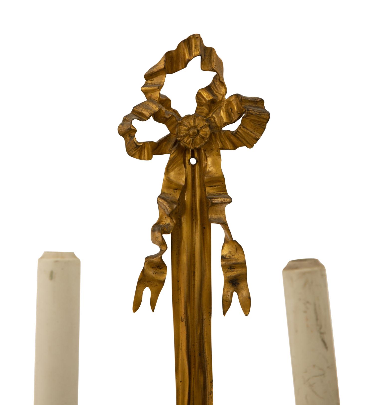 A Pair of Louis XVI Style Gilt Bronze Two-Light Sconces