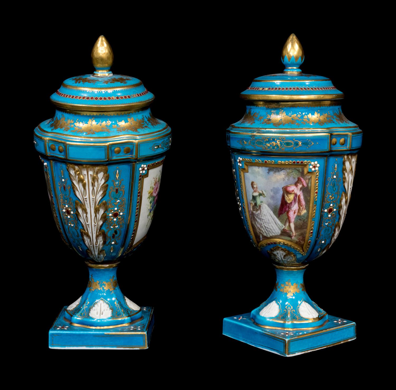 A Pair of 'Sevres' Porcelain Urns and Covers