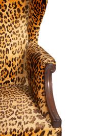 A George III Style Mahogany Wing Chair with Leopard Print Upholstery
