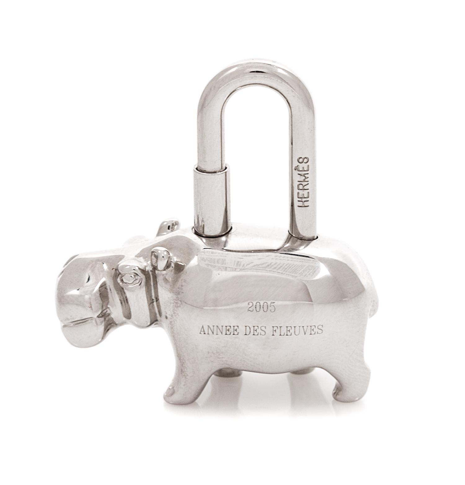 An Hermès Palladium Plated Hippopotamus Cadena Lock Charm, 1.5" L x 1.4" W.
